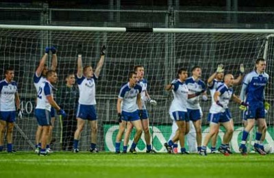 Monaghan players hold their line against a late Kildare free in their qualifers match at the weekend. Monaghan won 2-16 to 2-14 after extra time. Conor McManus kicked the equaliser in normal time.