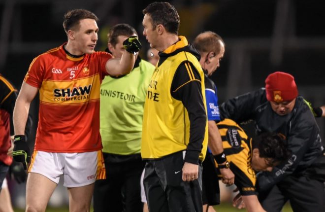 One of the Castlebar players exchanges words with Crossmaglen manager Oisin McConville