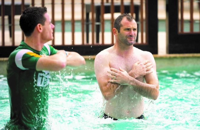 Ireland's Steven McDonnell and captain Stephen Cluxton, left, during a 'recovery session' in the swimming pool in advance of the 2011 2nd International Rules Series 2011 