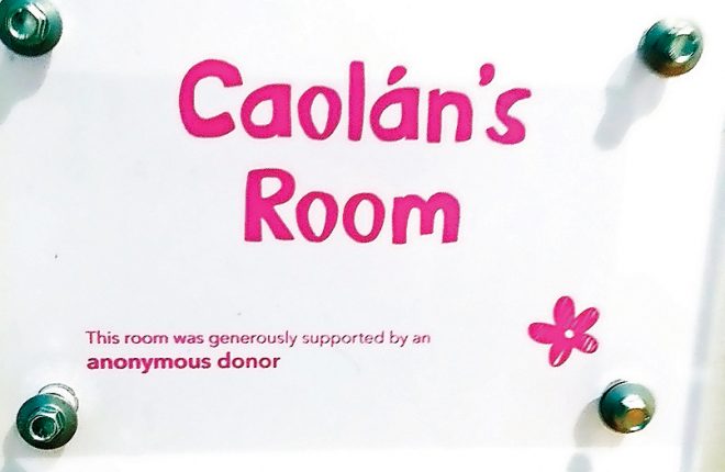 The plaque at the CLIC Sargent house in Belfast which remembers Caolan McCrossan