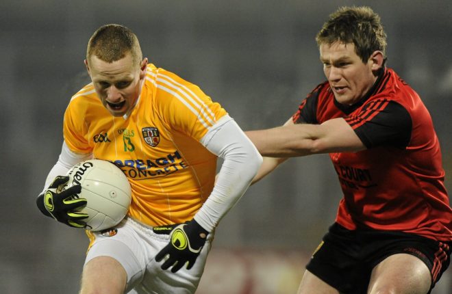 19 January 2011; Paddy Cunningham, Antrim, in action against Kevin Duffin, Down. Barrett Sports Lighting Dr. McKenna Cup, Section C, Antrim v Down, Casement Park, Belfast, Co. Antrim. Picture credit: Oliver McVeigh / SPORTSFILE