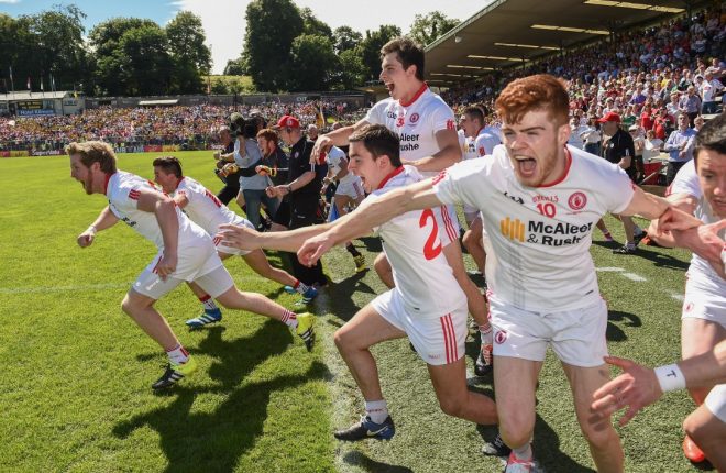 Tyrone's subs rush the field at the final whistle