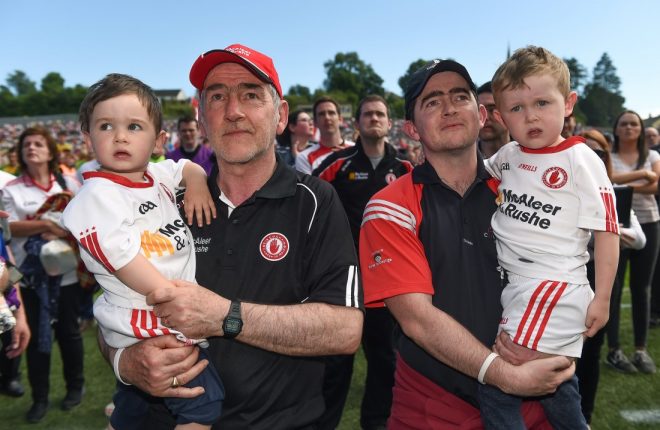 17 July 2016; Tyrone manager Mickey Harte along with grand son Michael and his son Mark Harte along with his other grandson Liam after the Ulster GAA Football Senior Championship Final match between Donegal and Tyrone at St Tiernach's Park in Clones, Co Monaghan. Photo by Oliver McVeigh/Sportsfile