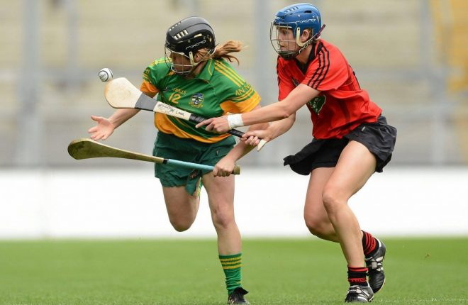 16 September 2012; Aileen Donnelly, Meath, in action against Fionnuala Carr, Down. All-Ireland Premier Junior Camogie Championship Final, Down v Meath, Croke Park, Dublin. Picture credit: Paul Mohan / SPORTSFILE